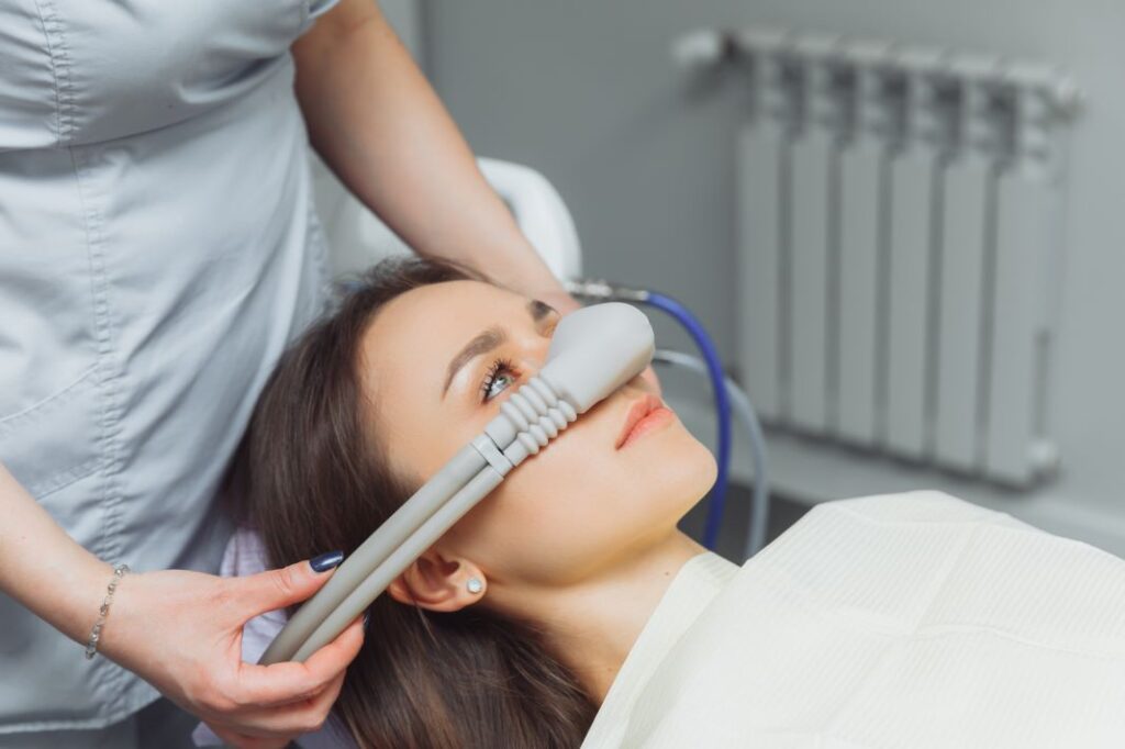 A woman getting nitrous oxide gas during a dental appointment